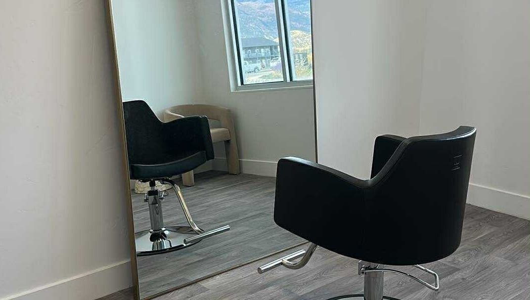 Modern salon chair and mirror in Brette Cody, Ephraim, Utah, US, offering a serene beauty retreat.