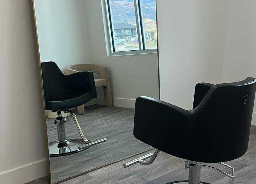 Modern salon chair and mirror in Brette Cody, Ephraim, Utah, US, offering a serene beauty retreat.