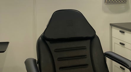 Elegant black treatment chair at Integrative Wellness & Aesthetics, Laredo, Texas, US.