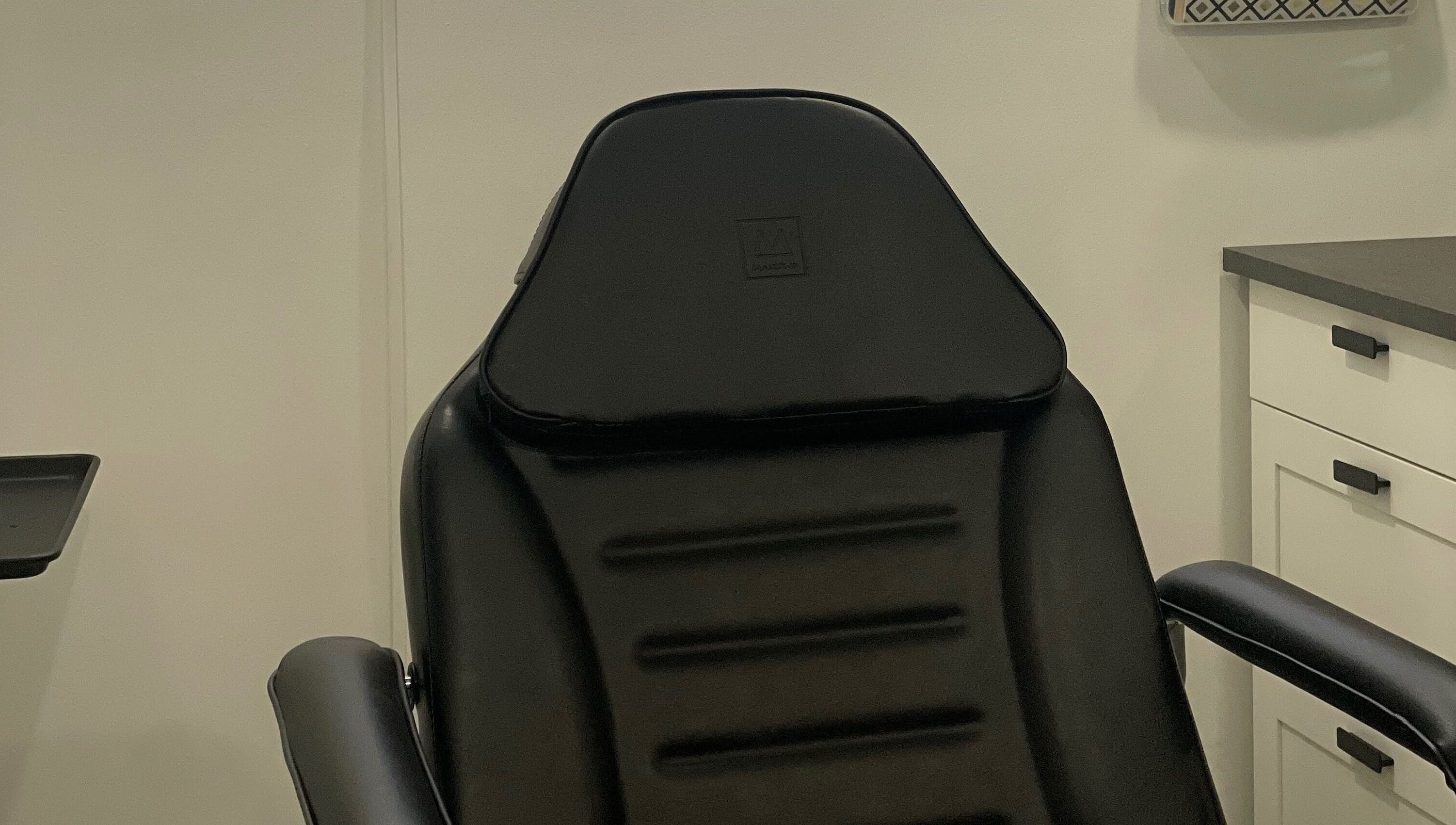 Elegant black treatment chair at Integrative Wellness & Aesthetics, Laredo, Texas, US.