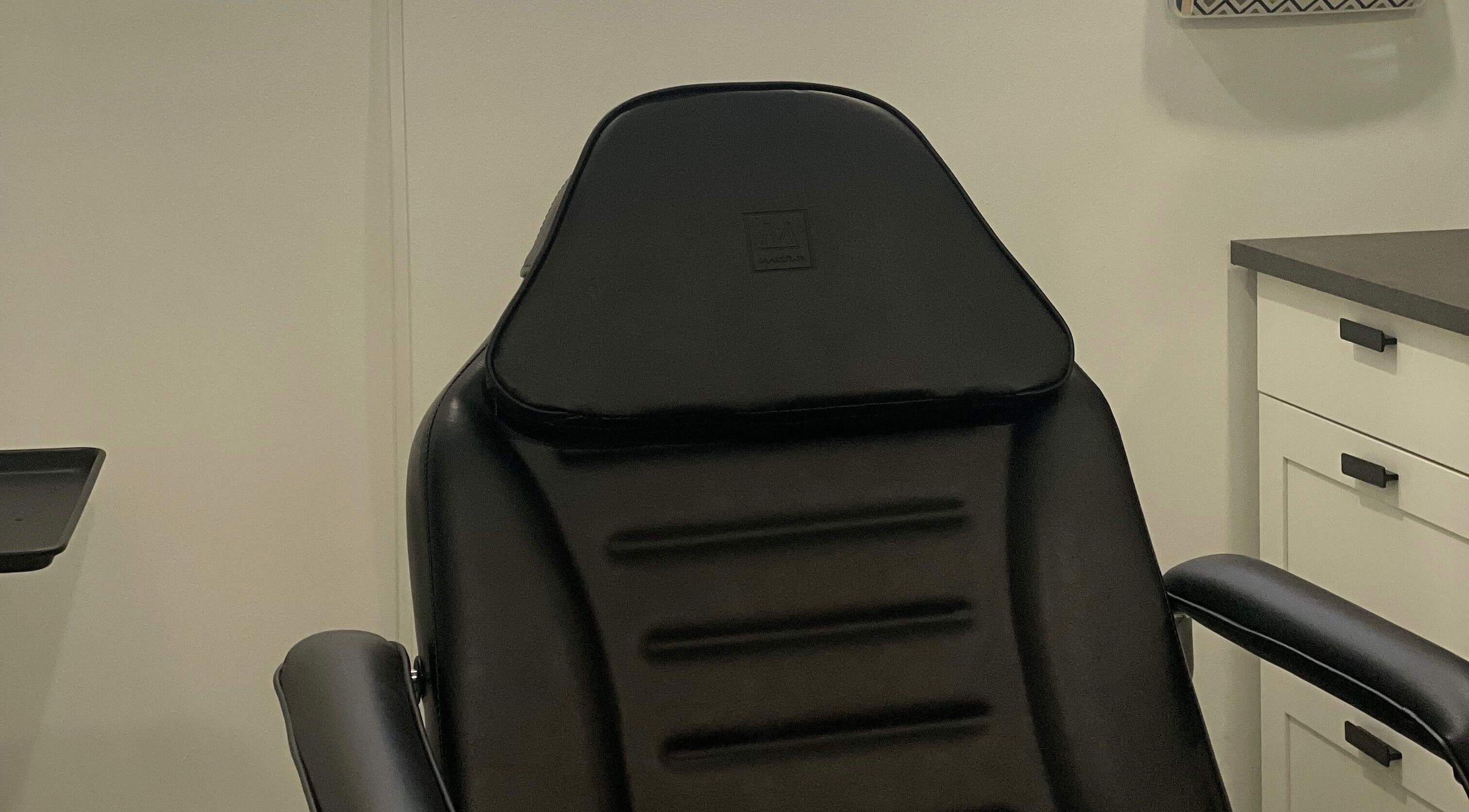 Elegant black treatment chair at Integrative Wellness & Aesthetics, Laredo, Texas, US.