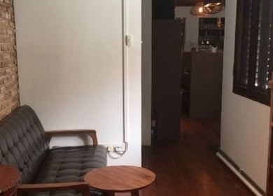 Relaxing seating area at Su-a hair studio, Singapore, Singapore, SG with modern decor.