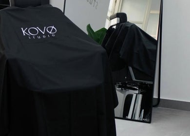 Modern barber chair at KutzByTmo, Dubai, Dubai, AE, showcasing sleek design in a stylish setting.