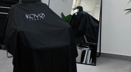 Modern barber chair at KutzByTmo, Dubai, Dubai, AE, showcasing sleek design in a stylish setting.