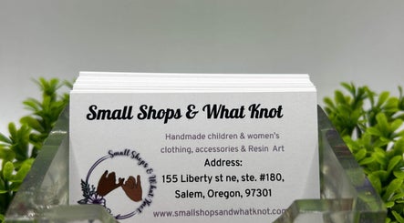 Stack of business cards at Gaby’s Glow Studio, Salem, Oregon, US, showcasing unique designs.