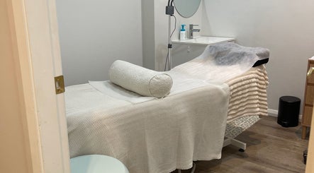 Treatment room at Sydney Lashess by Nicky, Manly, New South Wales, AU: Calm ambiance with bed and mirror.