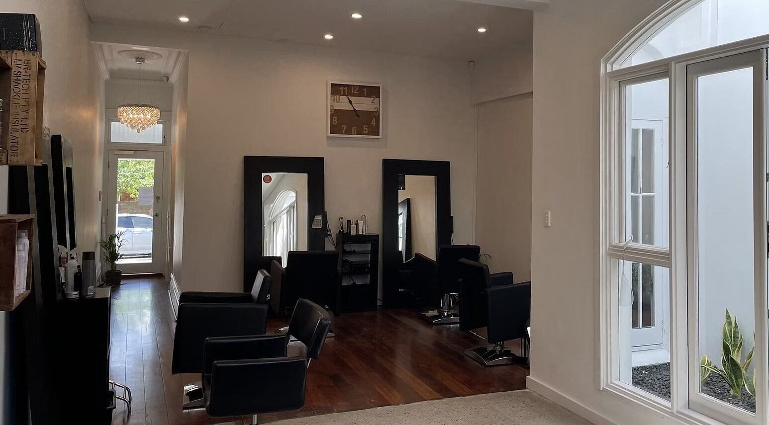 Chic interior of JLG - The Chemistry Of Great Hair in Subiaco, Western Australia, AU with stylish chairs and decor.