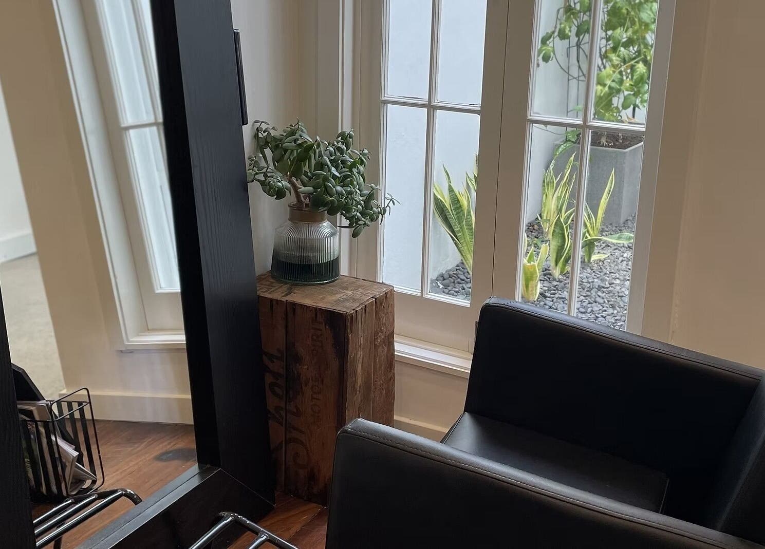 Tranquil hair styling chair by a window at JLG - The Chemistry Of Great Hair, Subiaco, Western Australia, AU.