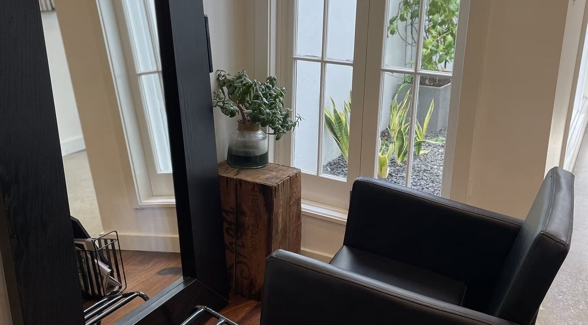 Tranquil hair styling chair by a window at JLG - The Chemistry Of Great Hair, Subiaco, Western Australia, AU.