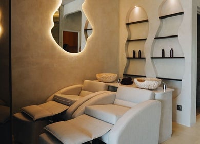 Luxury wellness room at Solve Sana in Bali, Bali, ID with cozy massage chairs and ambient lighting.
