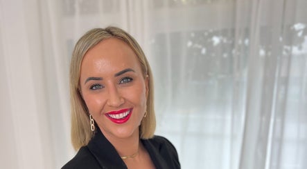 Professional welcoming visitor at The GLOW UP Clinic (Elsternwick), Melbourne, Victoria, AU.