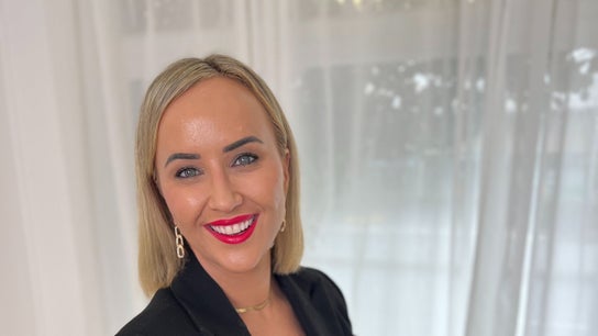 Professional welcoming smile at The GLOW UP Clinic (Elsternwick), Melbourne, Victoria, AU.