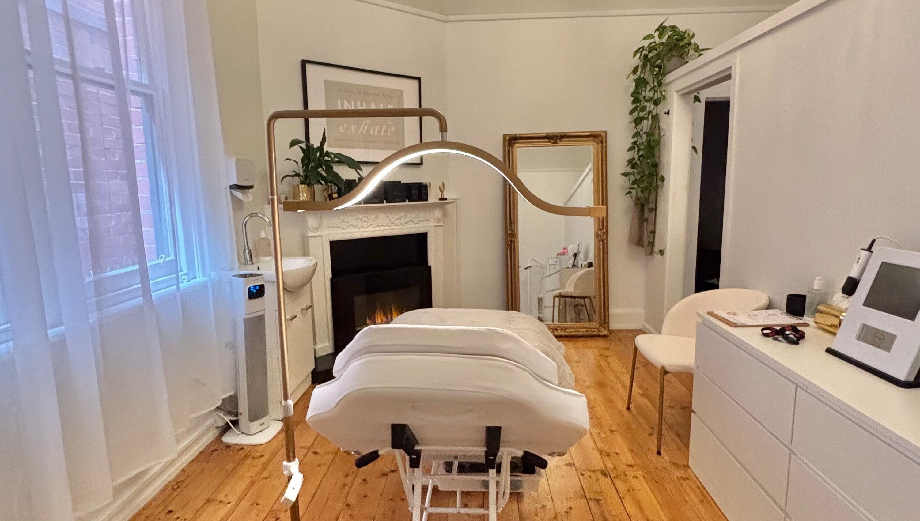 Tranquil treatment room at The GLOW UP Clinic (Elsternwick), Melbourne, Victoria, AU, with elegant decor.