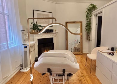 Tranquil treatment room at The GLOW UP Clinic (Elsternwick), Melbourne, Victoria, AU, with elegant decor.