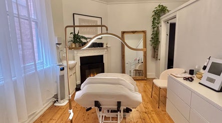 Tranquil treatment room at The GLOW UP Clinic (Elsternwick), Melbourne, Victoria, AU, with elegant decor.