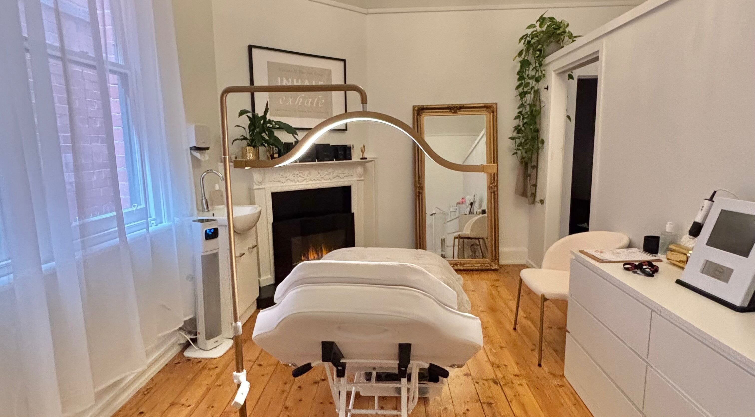 Tranquil treatment room at The GLOW UP Clinic (Elsternwick), Melbourne, Victoria, AU, with elegant decor.