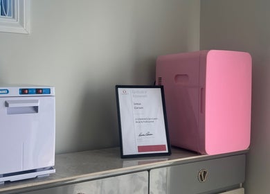 Towel warmer and pink unit at HomeGlow Aesthetics in Christchurch, Canterbury Region, NZ.