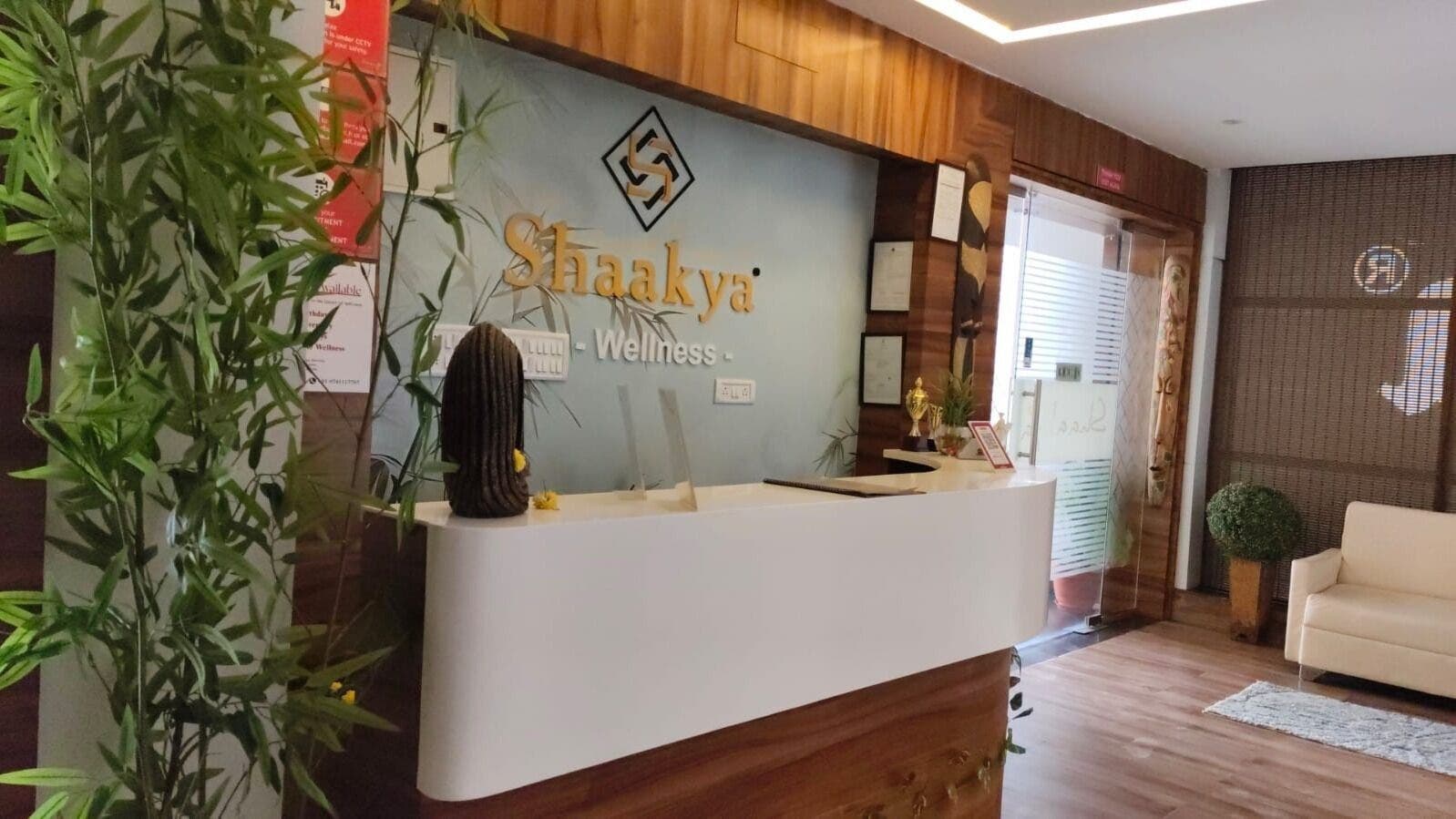 Reception area of Shaakya Spa & Wellness, Bengaluru, Karnataka, IN with plants and modern decor.