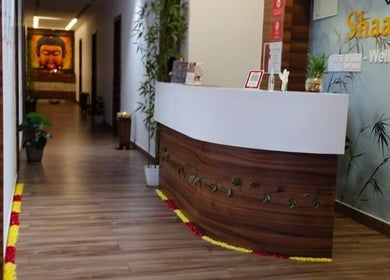 Welcoming reception at Shaakya Spa & Wellness, Bengaluru, Karnataka, IN, featuring elegant decor and a tranquil ambiance.