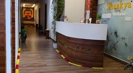 Welcoming reception at Shaakya Spa & Wellness, Bengaluru, Karnataka, IN, featuring elegant decor and a tranquil ambiance.