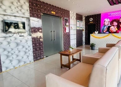 Chic lounge at Shaakya Salon & Spa, Bengaluru, Karnataka, IN, with modern decor and seating.