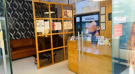 Cozy reception at Shaakya Spa & Salon in Bengaluru, Karnataka, IN with stylish decor and relaxed seating.