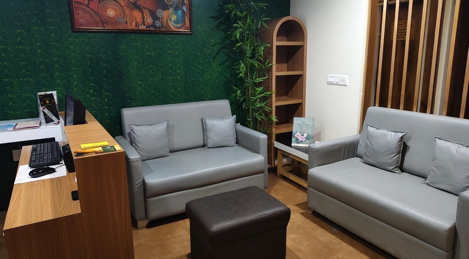 Relaxing lounge area at Shaakya Spa & Wellness, Bengaluru, Karnataka, IN with modern seating and vibrant decor.