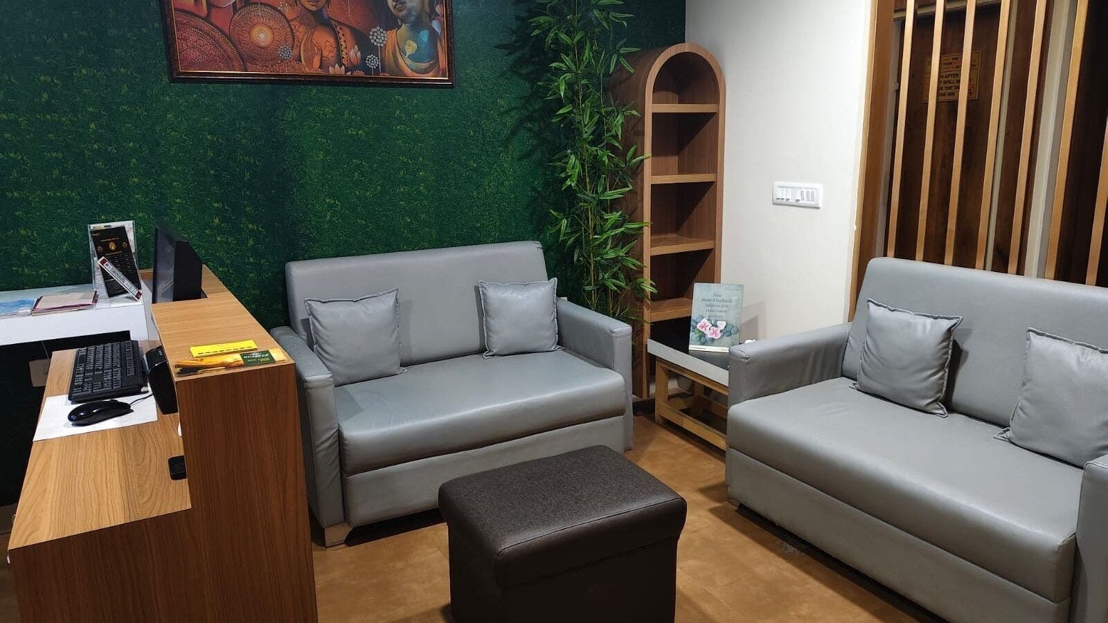 Relaxing lounge area at Shaakya Spa & Wellness, Bengaluru, Karnataka, IN with modern seating and vibrant decor.