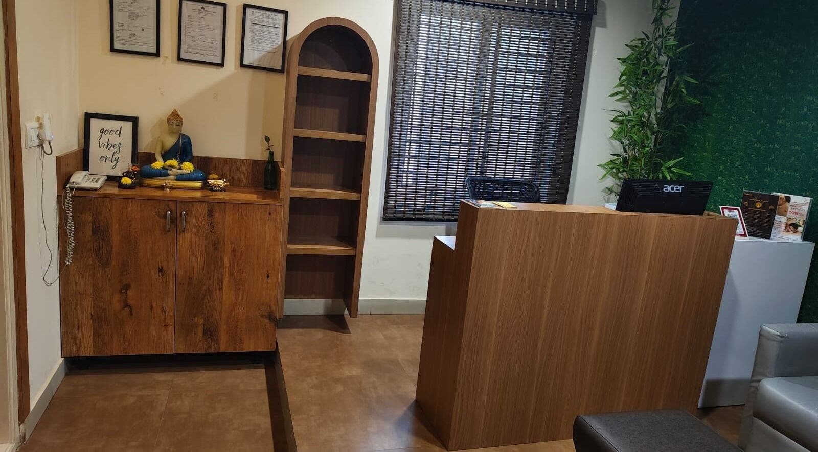 Reception area at Shaakya Spa & Wellness in Bengaluru, Karnataka, IN with a serene decor and Buddha statue.