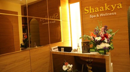 Reception area of Shaakya Spa & Wellness in Bengaluru, Karnataka, IN with floral decor and serene lighting.