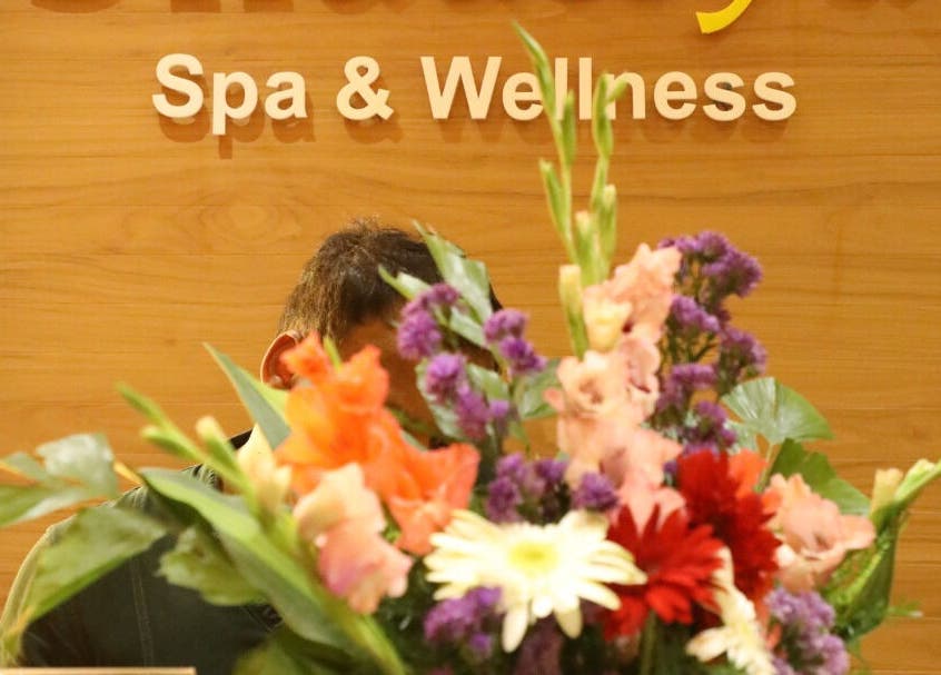 Vibrant floral arrangement at Shaakya Spa & Wellness reception in Bengaluru, Karnataka, IN.