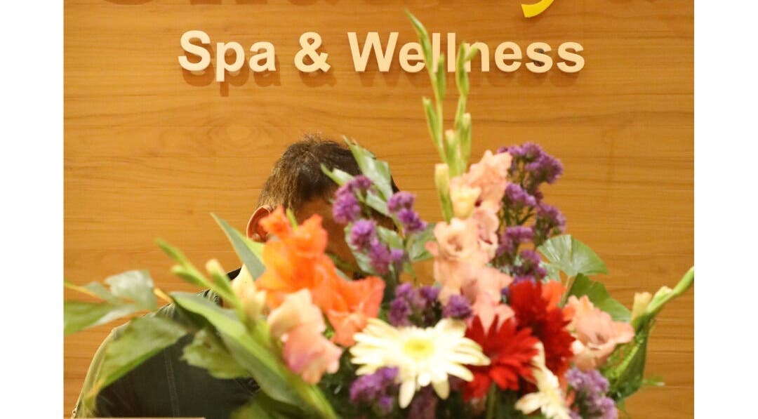 Vibrant floral arrangement at Shaakya Spa & Wellness reception in Bengaluru, Karnataka, IN.