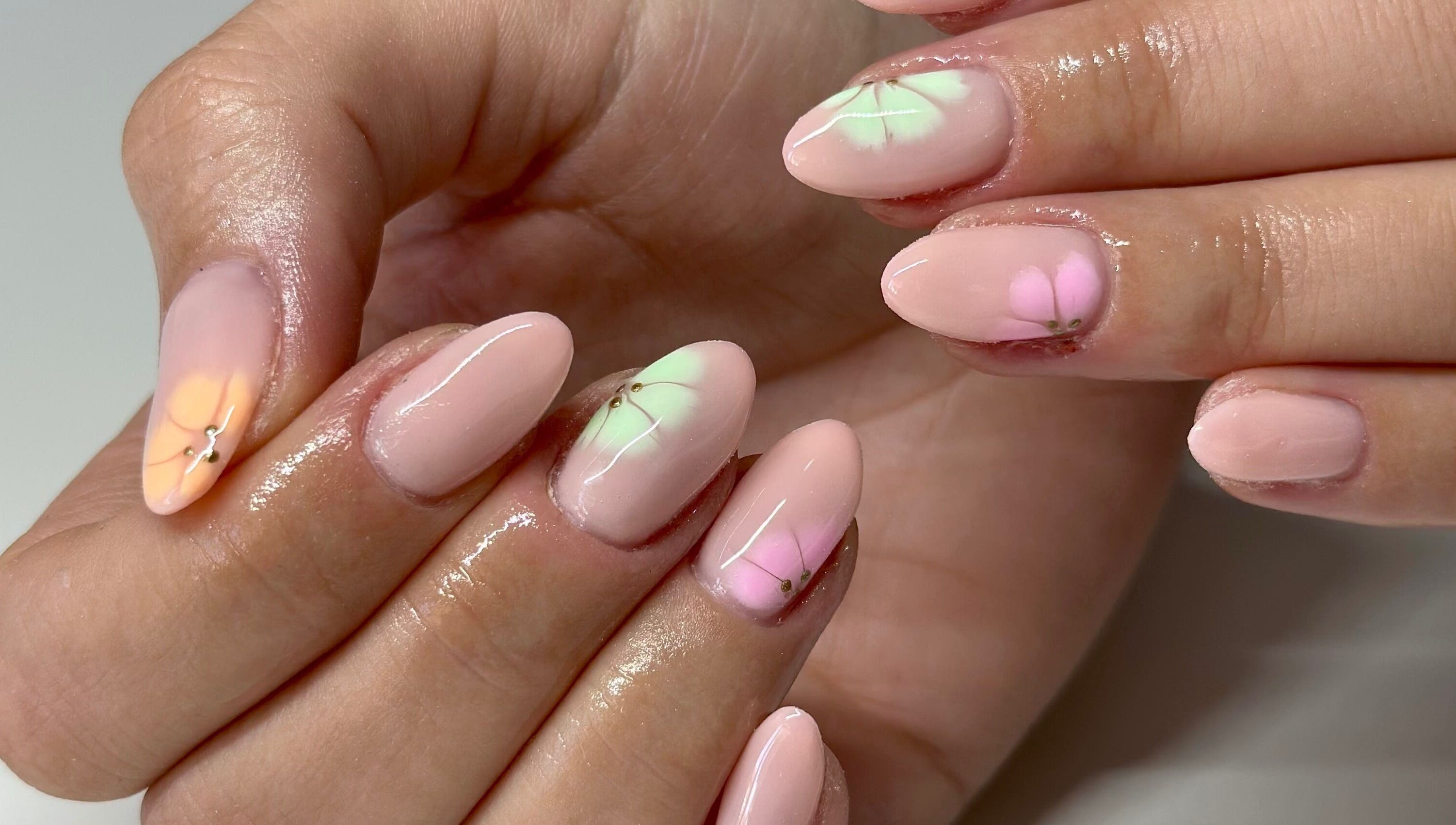 Elegant nail art with pastel floral design at Nails By Lauren, Crawley, England, GB.