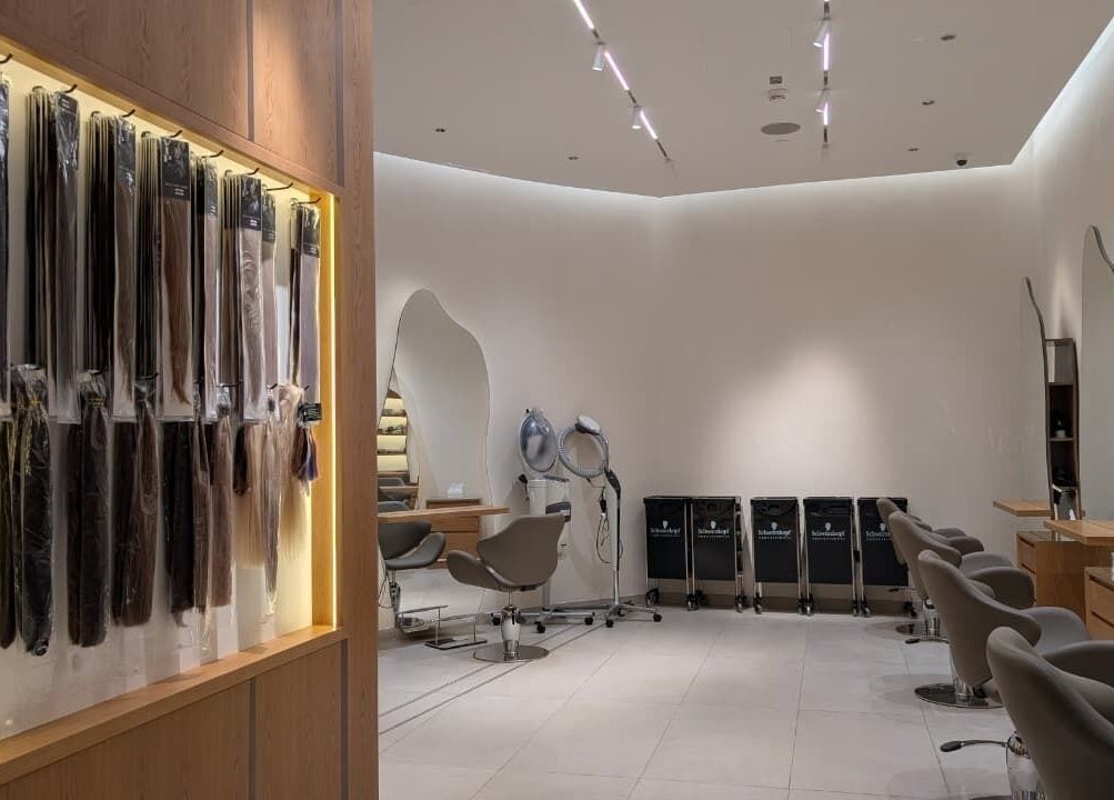 Modern salon interior with hair extensions at Class and Creation Ladies Beauty Salon, Abu Dhabi, AE.