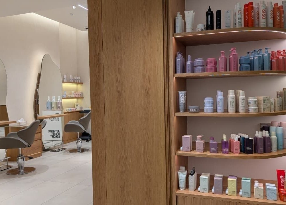 Class and Creation Ladies Beauty Salon in Abu Dhabi, AE showcases sleek shelves with premium beauty products.