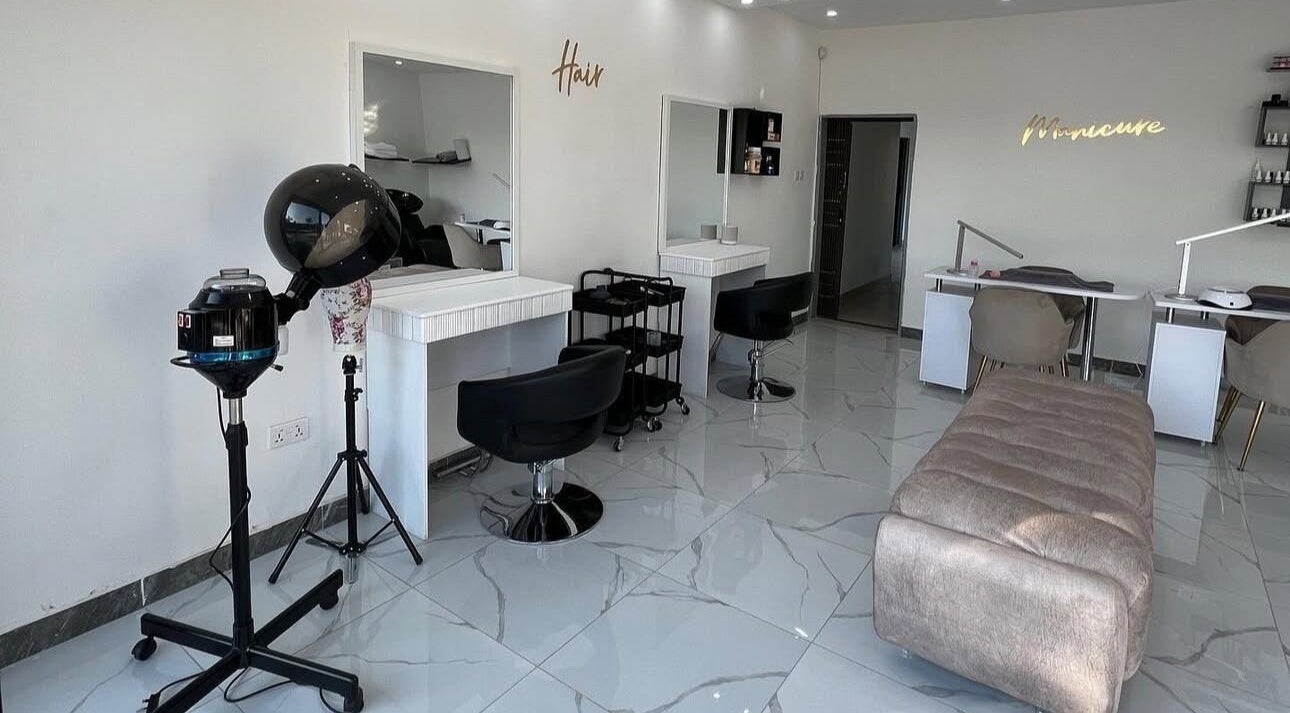 Modern salon interior at Lukanda Beauty Center, Lusaka with sleek styling stations and elegant design.