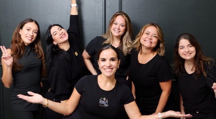 Smiling team at Anny-M Beauty Lounge, Orlando, Florida, US, showcasing professionalism and warmth.