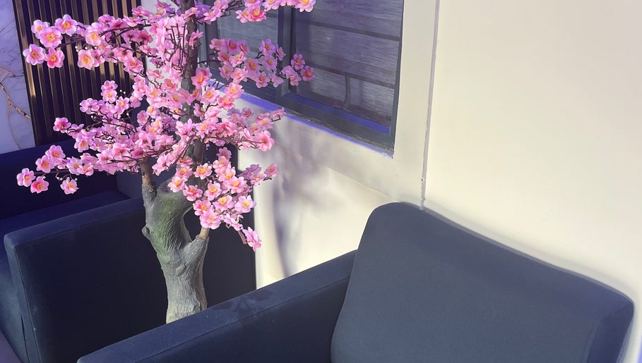 Elegant cherry blossom decor at PS Nail Bar, Randburg, Gauteng, ZA, enhances the serene salon ambiance.