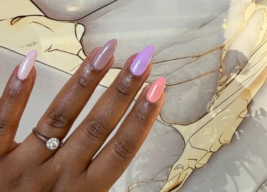 Colorful manicured nails at PS Nail Bar, Randburg, Gauteng, ZA, showcasing diverse nail polish shades.