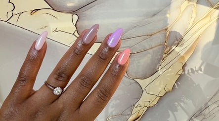 Colorful manicured nails at PS Nail Bar, Randburg, Gauteng, ZA, showcasing diverse nail polish shades.
