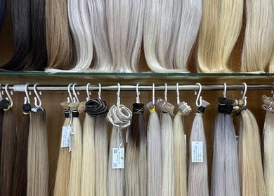 Variety of hair extensions at Bellavue Beauty Salon, Dubai, Dubai, AE, showcasing diverse colors and lengths.
