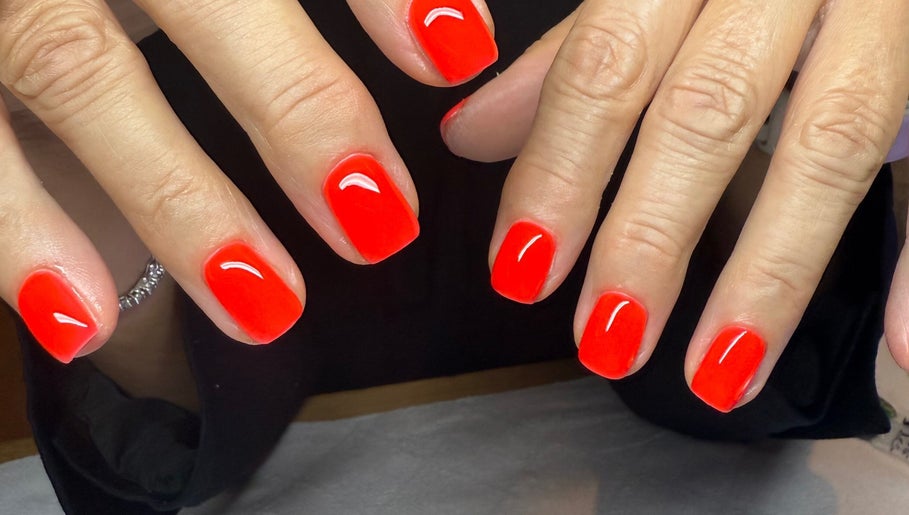 Bright red gel nails at BrauntonGels, Braunton, England, GB showcasing expert manicure service.