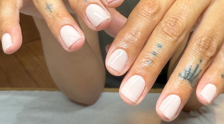 Close-up of freshly polished nails at BrauntonGels, Braunton, England, GB. Elegant and glossy manicure finish.