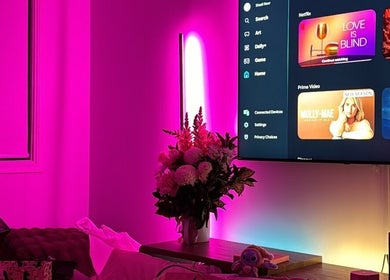 Elegant lounge with pink lighting and flowers at KLAWZ BY KAYLA, Maroubra, New South Wales, AU.