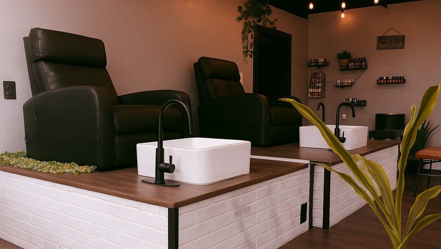 Luxurious pedicure chairs at Studio C by Carolyn Romero, Altamonte Springs, Florida, US. Elegant spa setup.