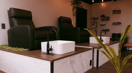 Luxurious pedicure chairs at Studio C by Carolyn Romero, Altamonte Springs, Florida, US. Elegant spa setup.