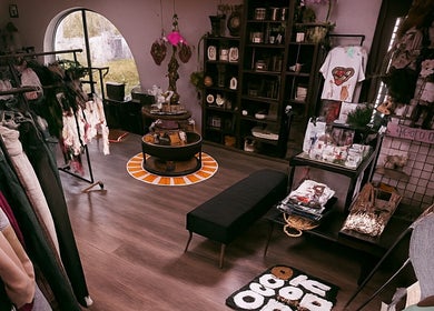 Studio C by Carolyn Romero in Altamonte Springs, Florida showcases a stylish interior with unique decor and racks.