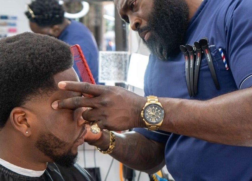 Master barber provides precise haircut at Flawlesscuts, Oshawa, Ontario, CA.