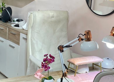 Cozy nail station at Tenaj Nails & Beauty, Accra, Greater Accra Region, GH, featuring elegant decor and lighting.
