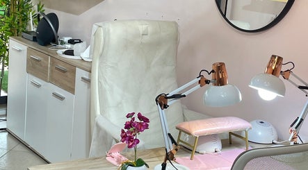 Cozy nail station at Tenaj Nails & Beauty, Accra, Greater Accra Region, GH, featuring elegant decor and lighting.